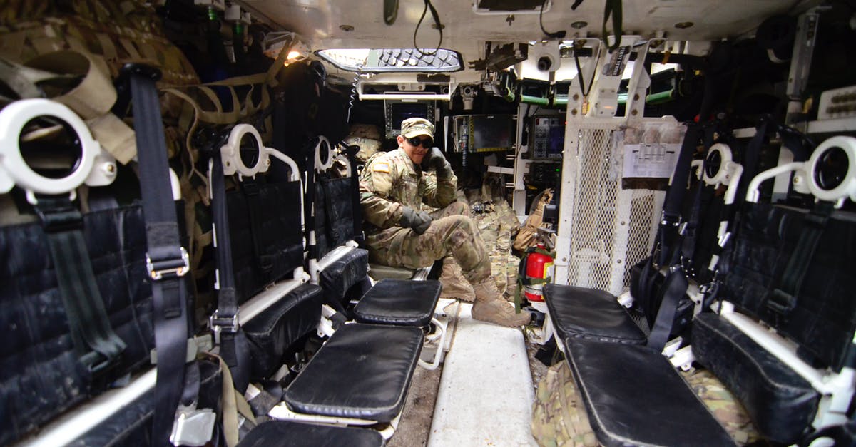 How do I shapeshift into a scientist or military personnel? - Man in Soldier Suit Sitting in Black Leather Seat How do I shapeshift into a scientist or military personnel? - Man in Soldier Suit Sitting in Black Leather Seat