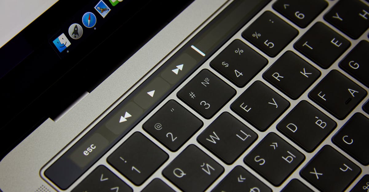 How do I sign up for Pokémon go on my computer using a Google account? - Black computer keyboard buttons with white signs
