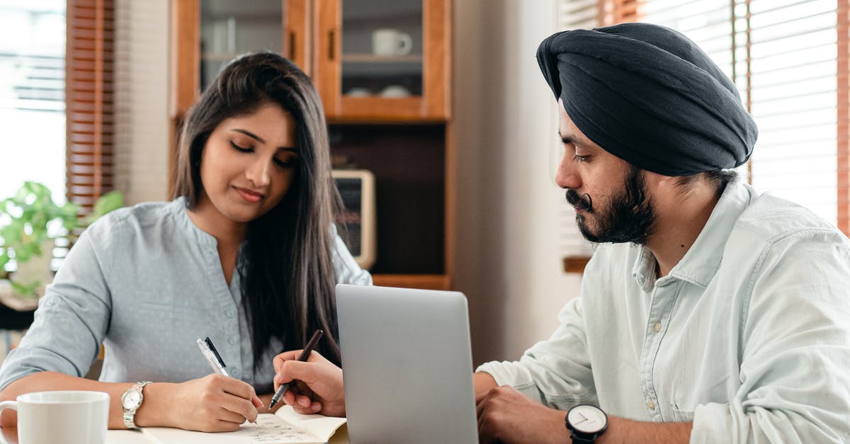 How do I solve Question 42, Level 5 in Think Different? - Focused tutor and student doing homework assignment using laptop How do I solve Question 42, Level 5 in Think Different? - Focused tutor and student doing homework assignment using laptop