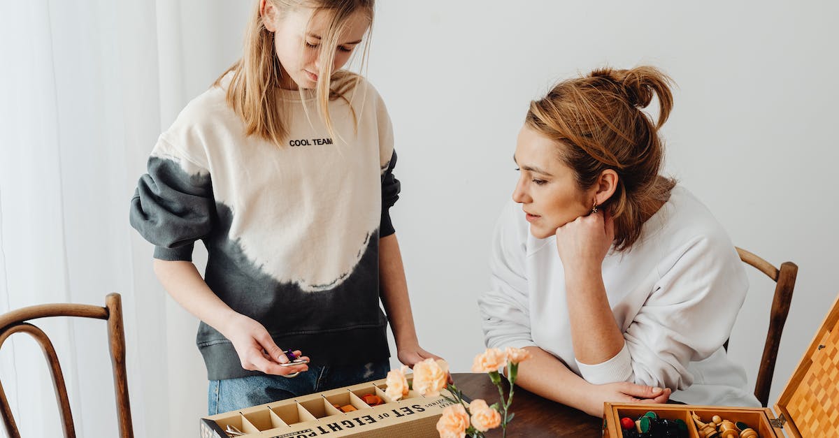 How do I solve the puzzles in the Immaculates Trial? - Women Playing Brain Teaser Toys Puzzle