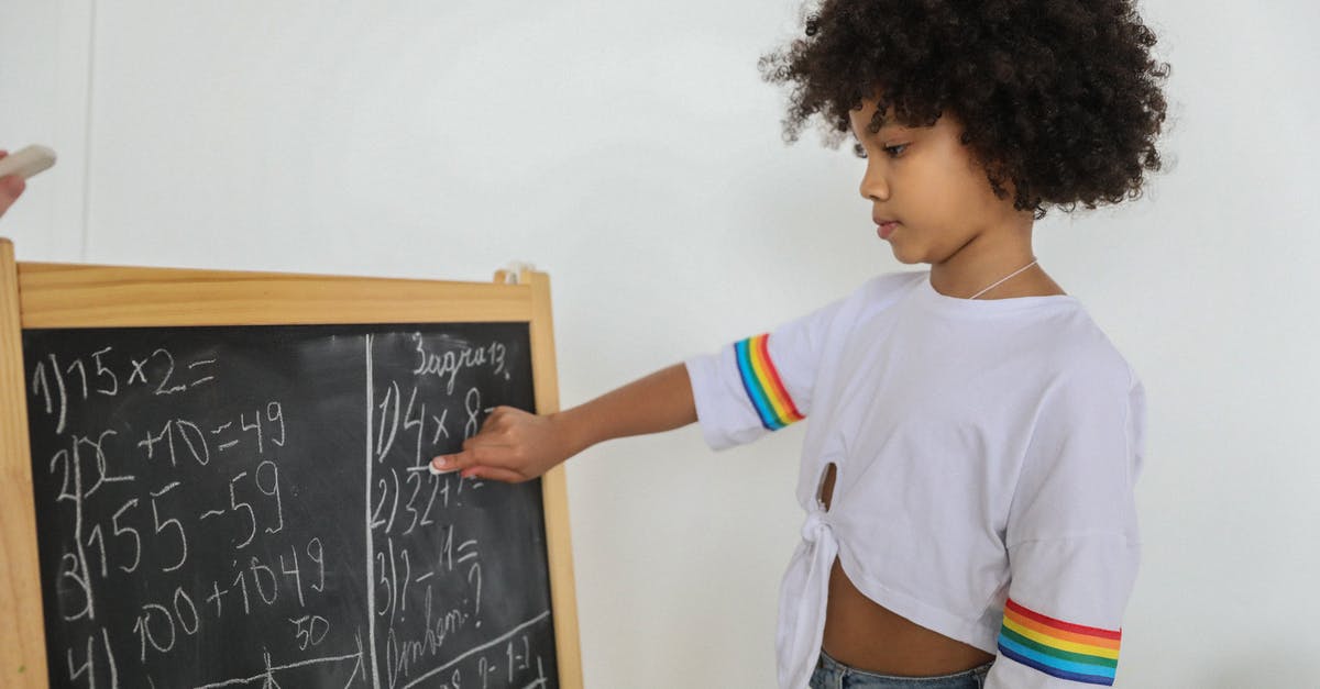 How do I solve this 'lights-on' puzzle? - Side view of pensive black girl pointing at mathematical example on blackboard at light room in daytime How do I solve this 'lights-on' puzzle? - Side view of pensive black girl pointing at mathematical example on blackboard at light room in daytime