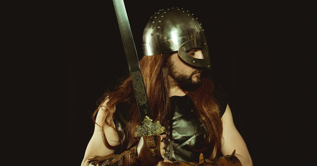 How do I spawn a skeleton with enchanted leather armor riding a creeper? [duplicate] - Long Haired Man in Metal Helmet and Leather Gloves Holding Silver Sword