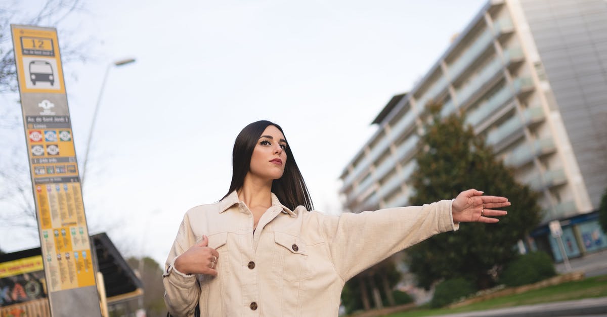 How do I stop a rush as the British in AoE 3 - Concentrated young female with long dark hair in stylish clothes catching taxi while standing near bus stop in modern city How do I stop a rush as the British in AoE 3 - Concentrated young female with long dark hair in stylish clothes catching taxi while standing near bus stop in modern city