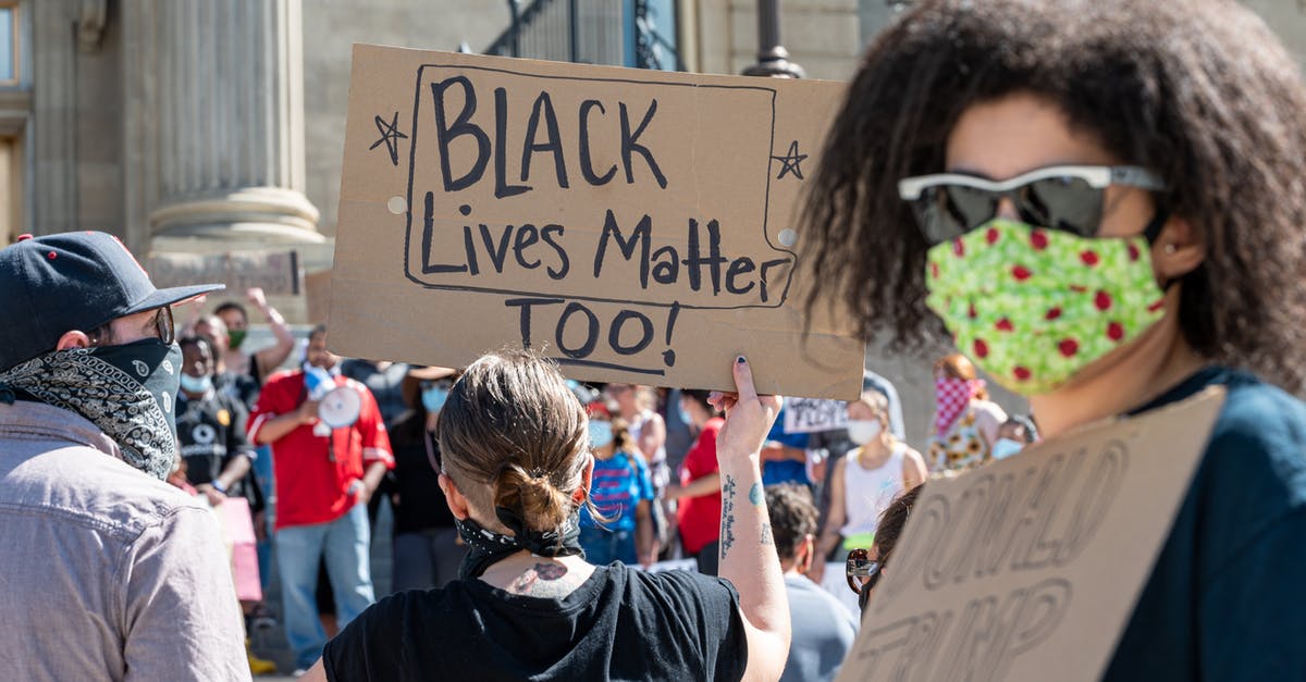 How do I stop people from changing my name in cube2 sauerbraten? - Unrecognizable people protesting on street with sign How do I stop people from changing my name in cube2 sauerbraten? - Unrecognizable people protesting on street with sign