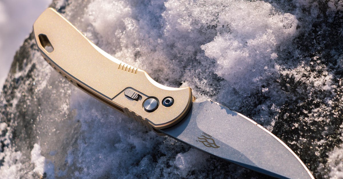 How do I summon a weapon or tool with a low durability - Silver and Gold Switchblade on Gray and White Surface How do I summon a weapon or tool with a low durability - Silver and Gold Switchblade on Gray and White Surface