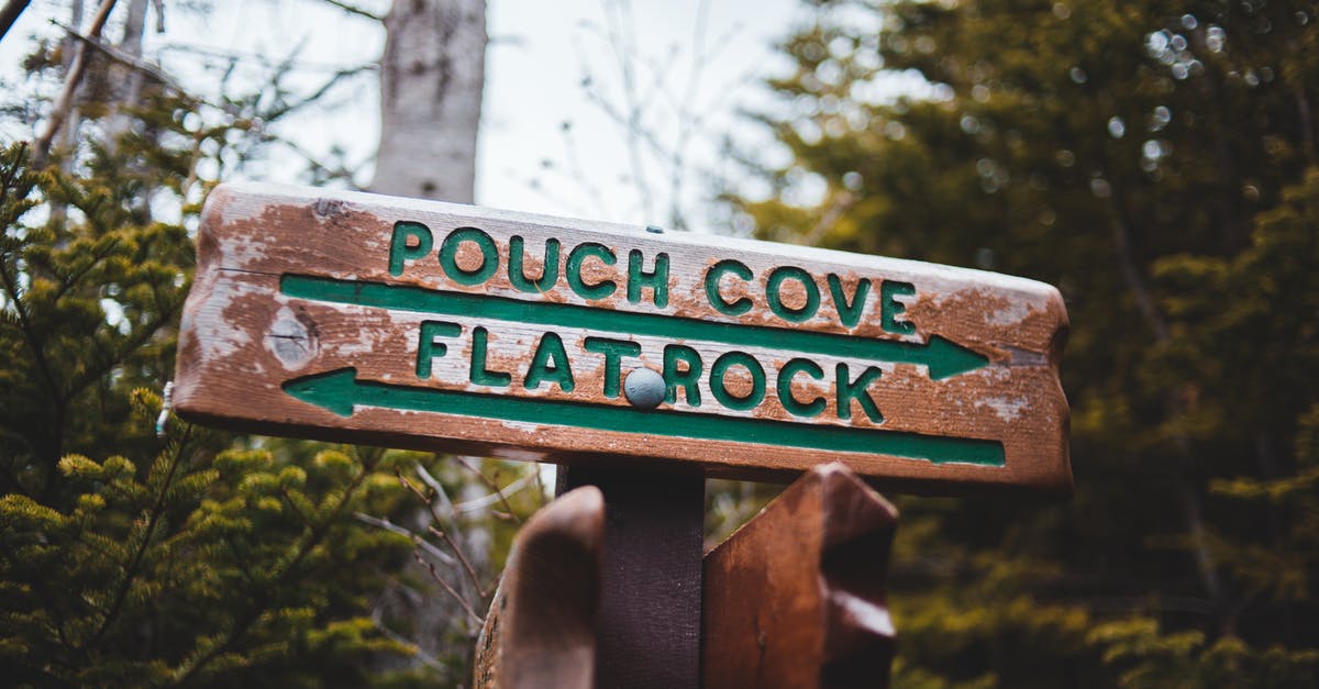 How do I /tellraw the location of an arrow? - Wooden sign on pole in forest How do I /tellraw the location of an arrow? - Wooden sign on pole in forest