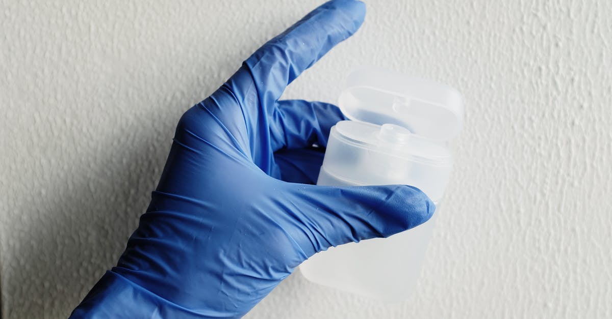 How do I test where the nearest wall is in Minecraft 1.16? - Person Wearing Blue Gloves Holding Plastic Container