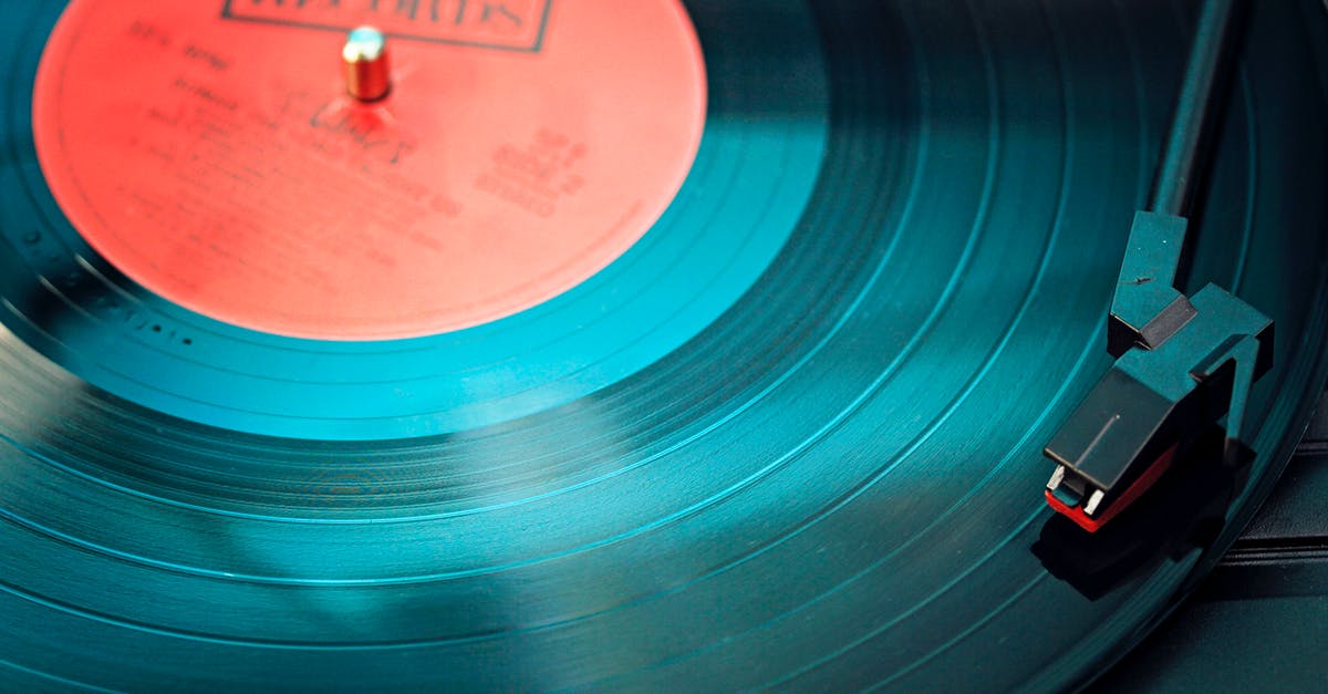 How do I testfor anyone that is not the specified player - Blue Vinyl Record Playing on Turntable