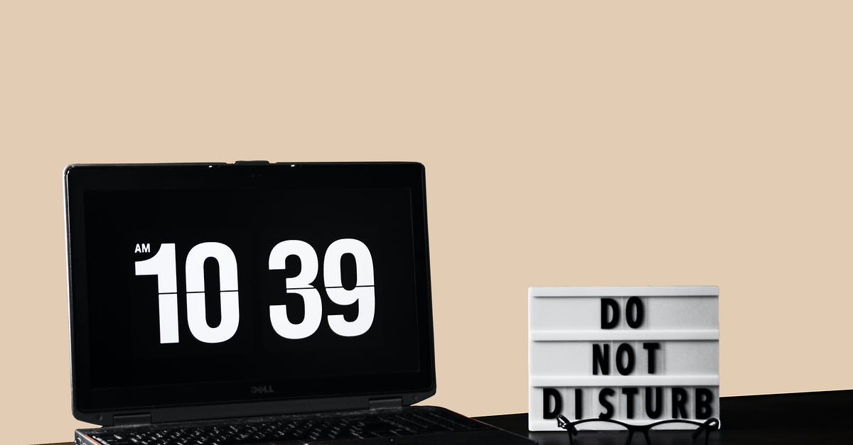 How do I time an EMMI counter? - Computer Laptop on Wooden Table