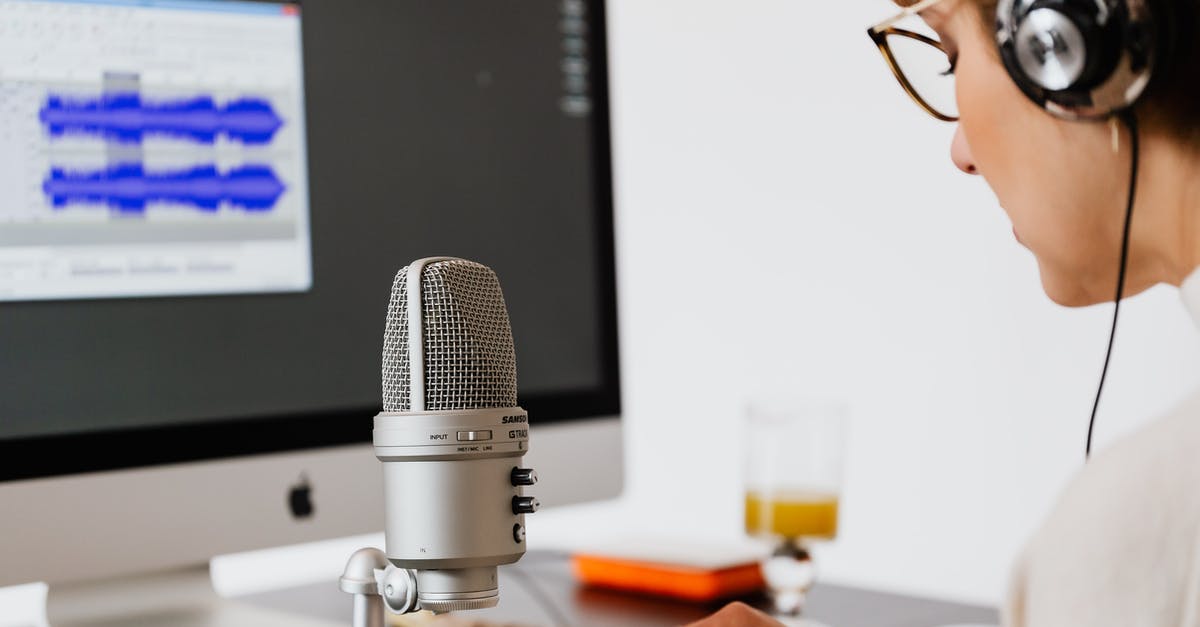 How do I use a Kinect as a mic while using headphones? - Person Using Microphone