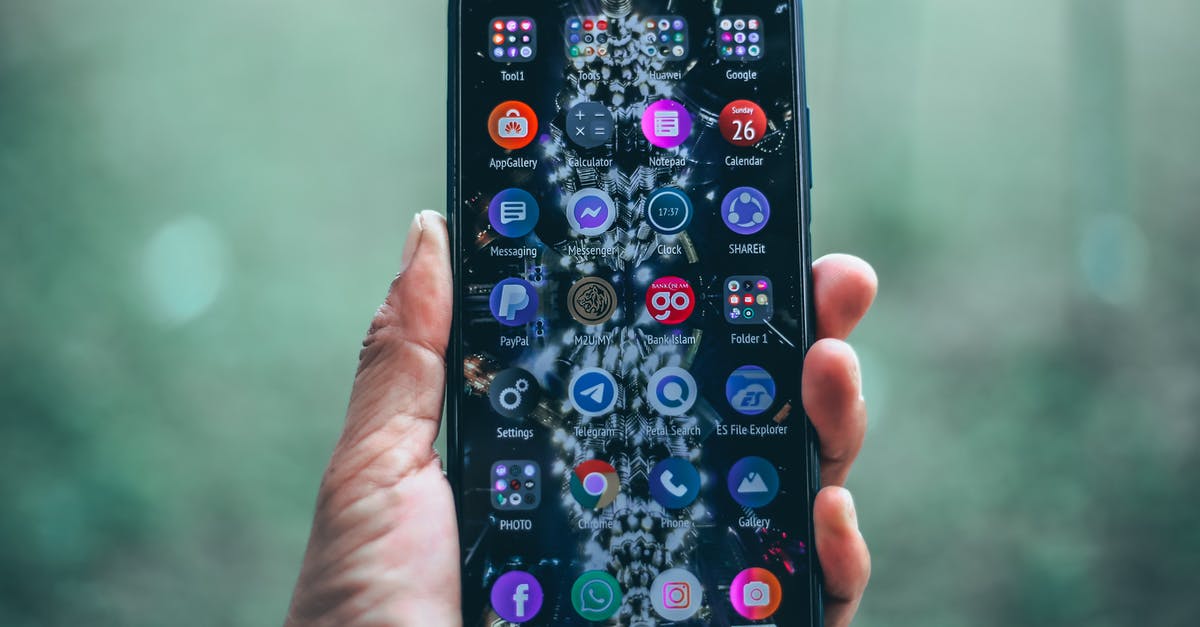 How do I use an ME interface terminal with my patterns? - Crop person holding modern mobile phone