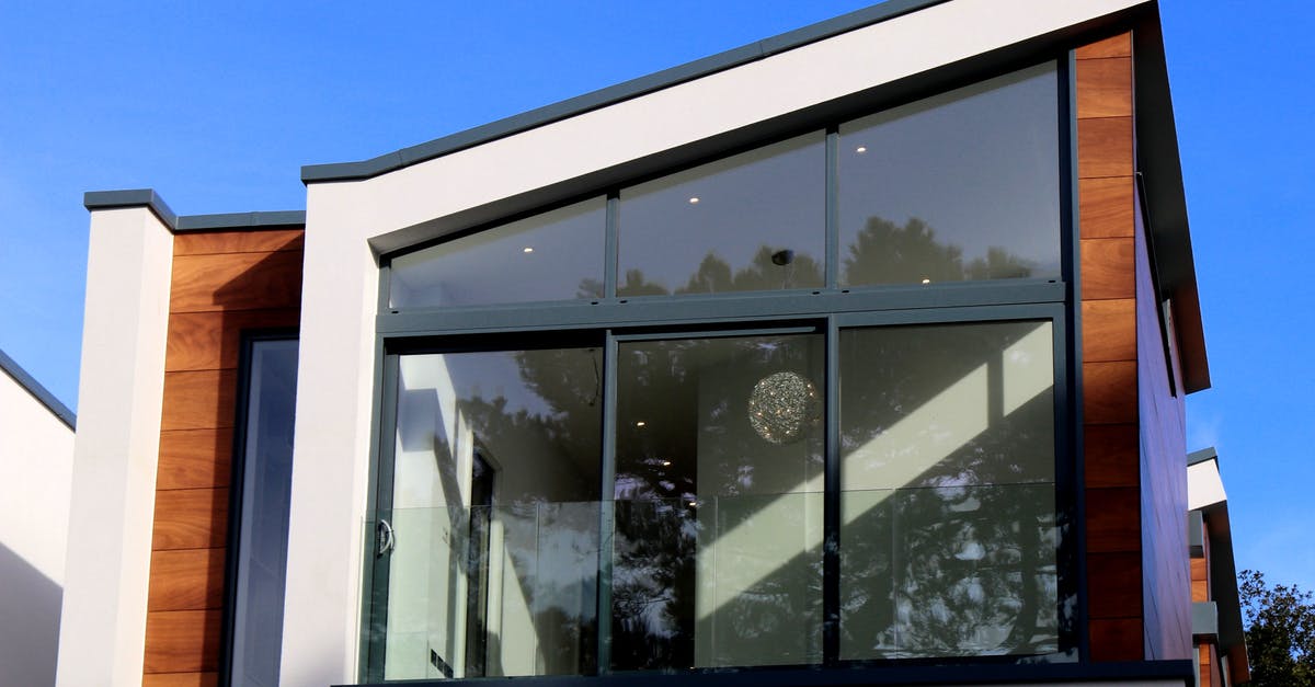 How do I ward off Springtrap in FNAF 3 when he is at the office door? - Modern Building Against Blue Sky