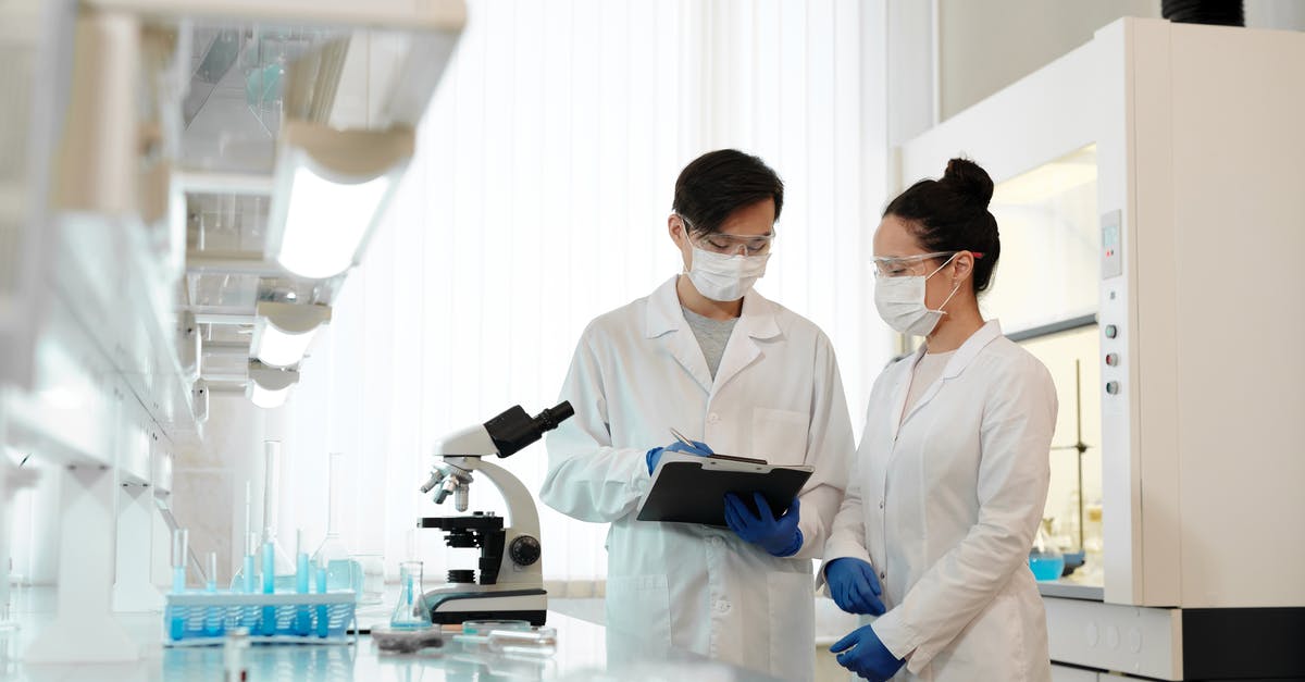 How do labs and scientists work? - Two Scientists Working Inside the Laboratory