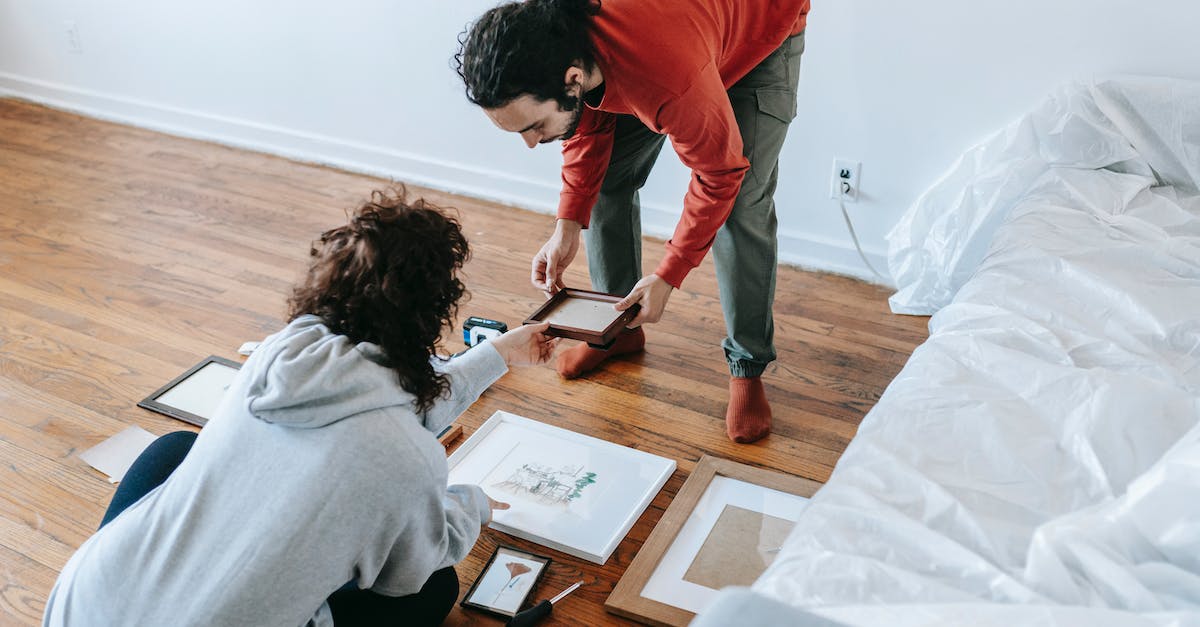 How do people know what they can get out of trade up contracts? - Couple Checking Out A Picture Frame How do people know what they can get out of trade up contracts? - Couple Checking Out A Picture Frame