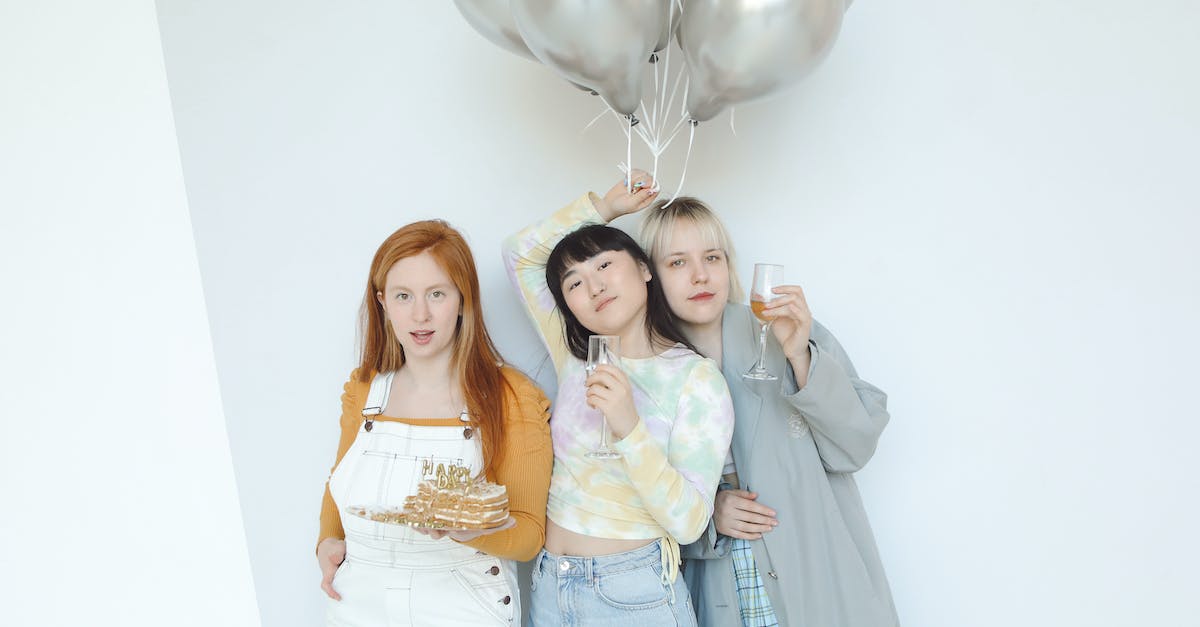 How do Pokemon that require friendship evolve? - Girls Posing with Silver Balloons at a Birthday Party