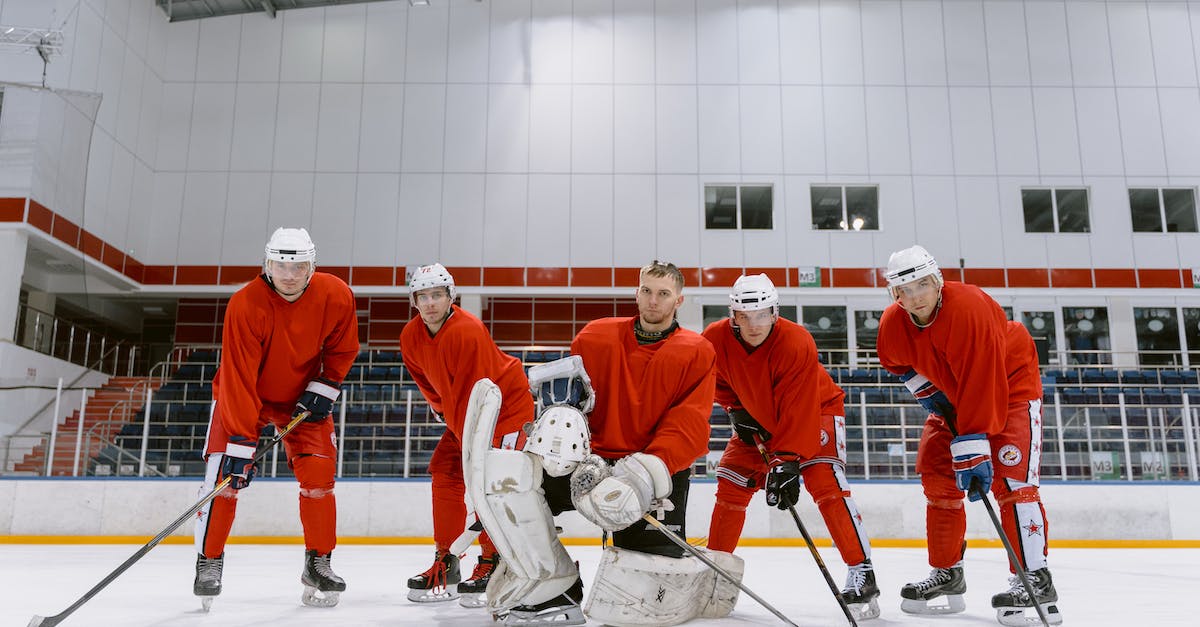 How do professional League of Legends players make money? - 2 Men Playing Hockey Inside White Building How do professional League of Legends players make money? - 2 Men Playing Hockey Inside White Building