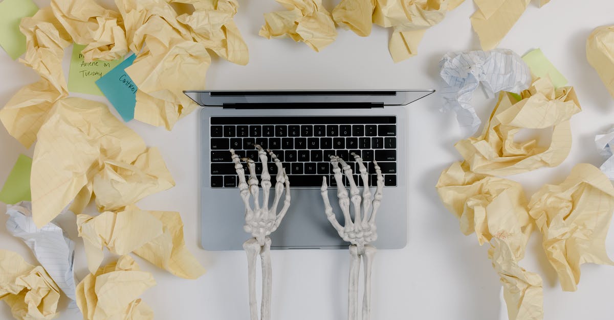 How do the fell arms work? - Crumpled Papers Beside a Laptop