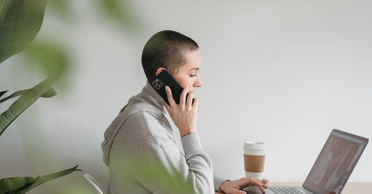 How do the sets work that call additional followers to your side? - Woman talking on smartphone and working on laptop at home How do the sets work that call additional followers to your side? - Woman talking on smartphone and working on laptop at home