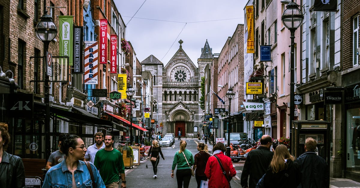 How do travelers work? - Photo of People Walking on Street How do travelers work? - Photo of People Walking on Street