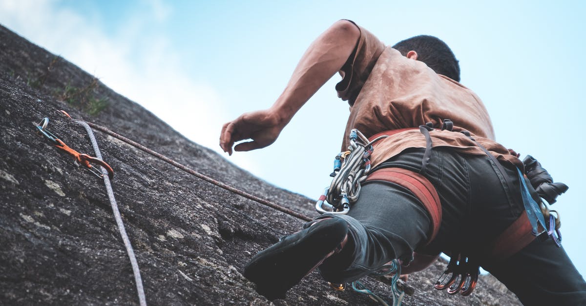 How do units get Altitude Training in Civilization 5? - Unrecognizable mountaineer climbing on cliff