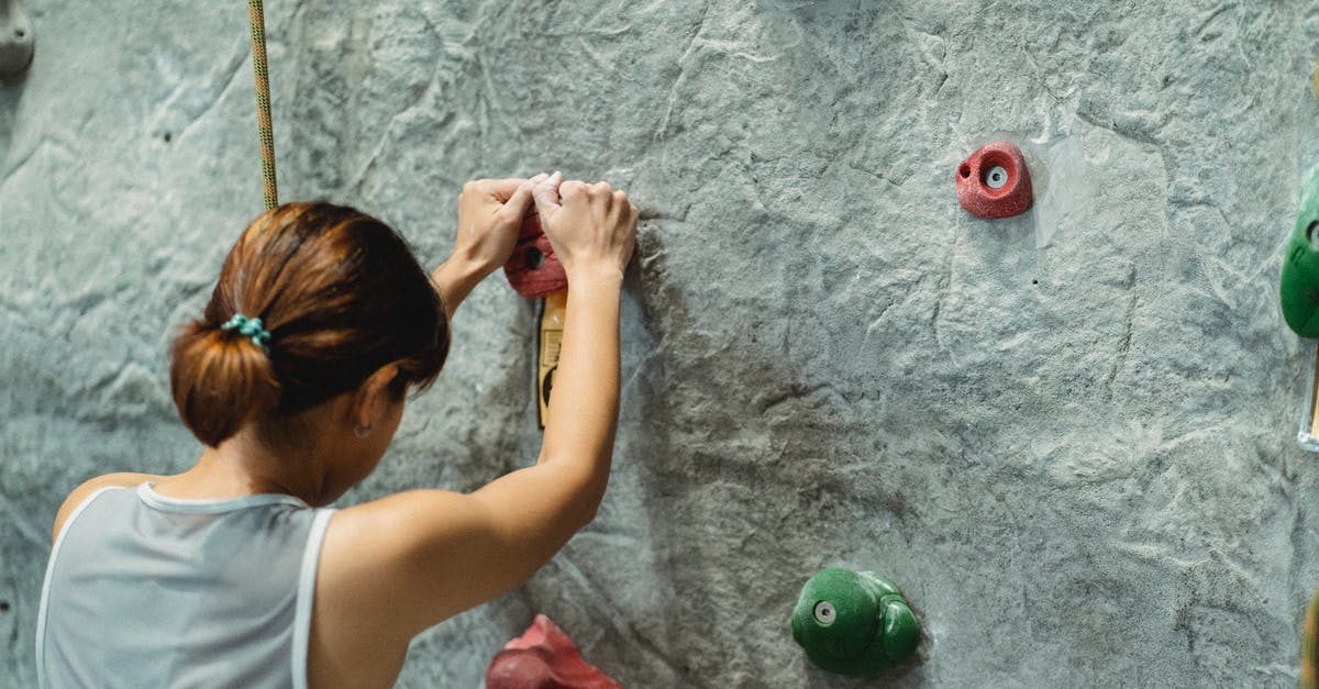 How do units get Altitude Training in Civilization 5? - Young woman climbing on gray wall
