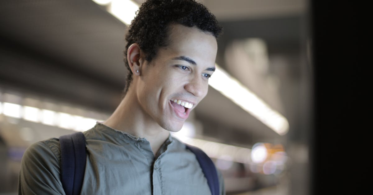 How do vending machine Upgrades work? - Excited ethnic man interacting with touch screen display in city How do vending machine Upgrades work? - Excited ethnic man interacting with touch screen display in city