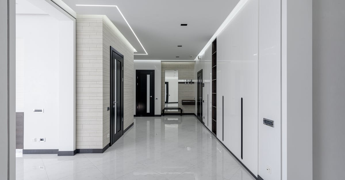 How do you break the one tile high speed booster block in Ferenia? - Spacious hall with wooden doors in modern house