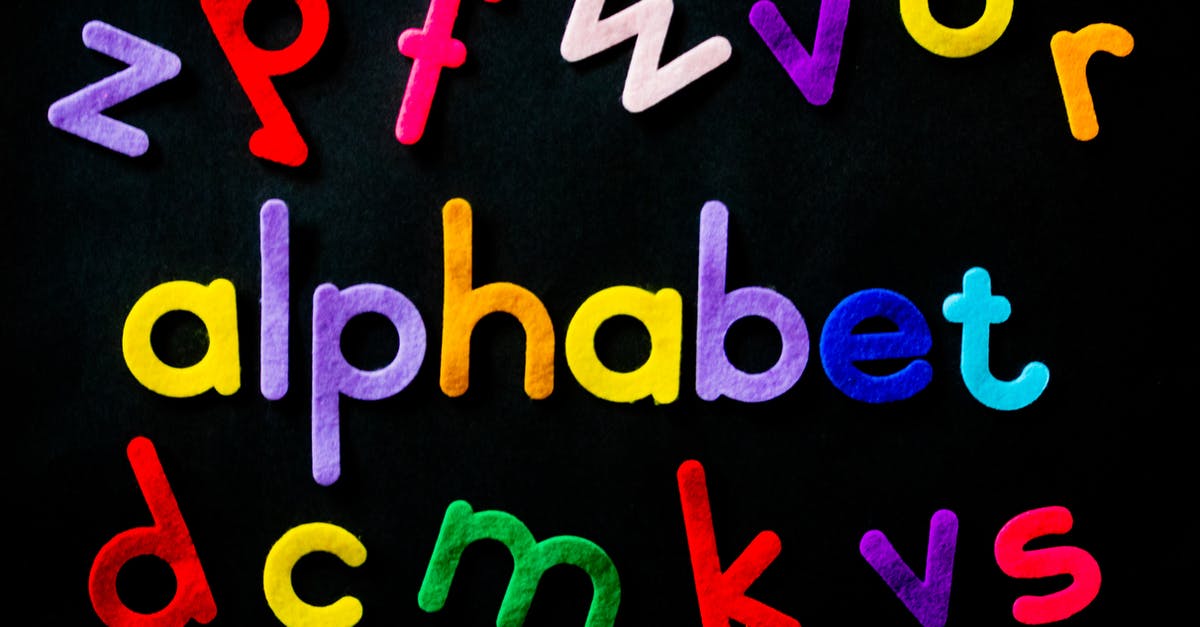 How do you change the color of your text when typing in clan chat? - Assorted-color Alphabet on Black Background