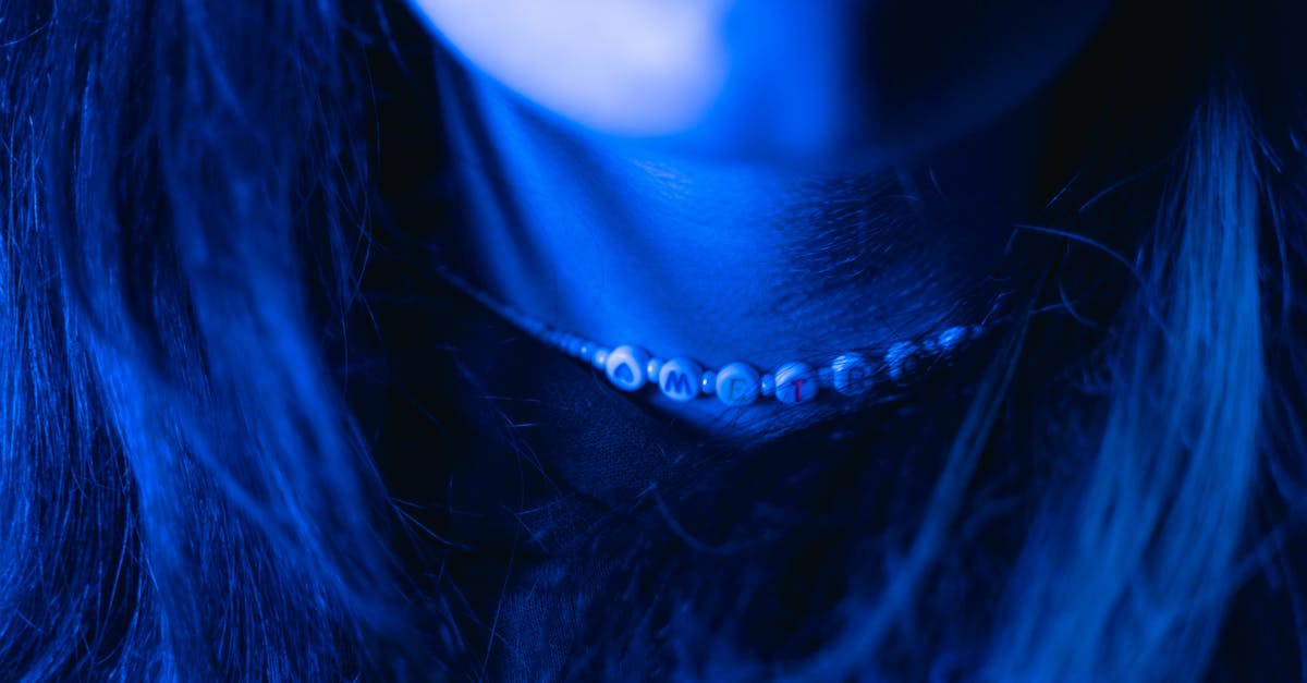 How do you do a neck flip? - Woman Wearing Silver Diamond Studded Earring How do you do a neck flip? - Woman Wearing Silver Diamond Studded Earring