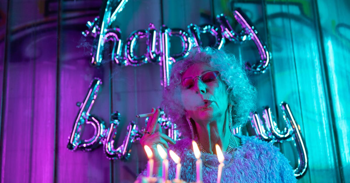 How do you do a takedown after a smoke pellet? - Close-Up Photo of Lighted Candles on Cake 