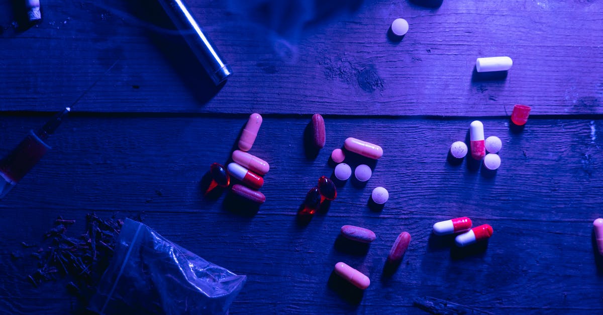 How do you do a takedown after a smoke pellet? - Red and White Medication Pill on Black Wooden Table