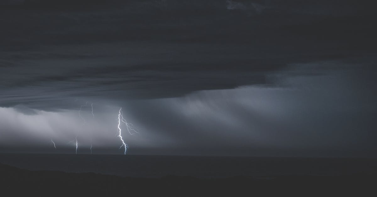 How do you effectively fight when armatized with a wind seraph? - Cloudy rainy sky with shiny bright lightning in stormy ocean at late night