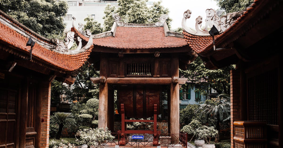 How do you get a shrine - Brown and White Concrete Building