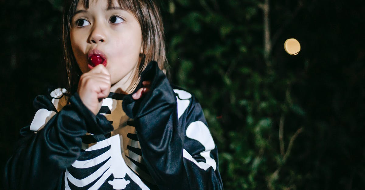 How do you get the Bone Charm in Mission 7, 'The Flooded District'? - Crop contemplative girl in skeleton costume eating delicious lolly while looking away during festive occasion in park in twilight How do you get the Bone Charm in Mission 7, 'The Flooded District'? - Crop contemplative girl in skeleton costume eating delicious lolly while looking away during festive occasion in park in twilight