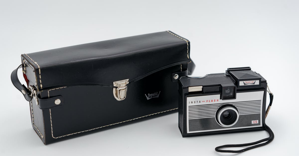 How do you interrogate someone in Another Case Solved? - Black and Silver Camera on White Table