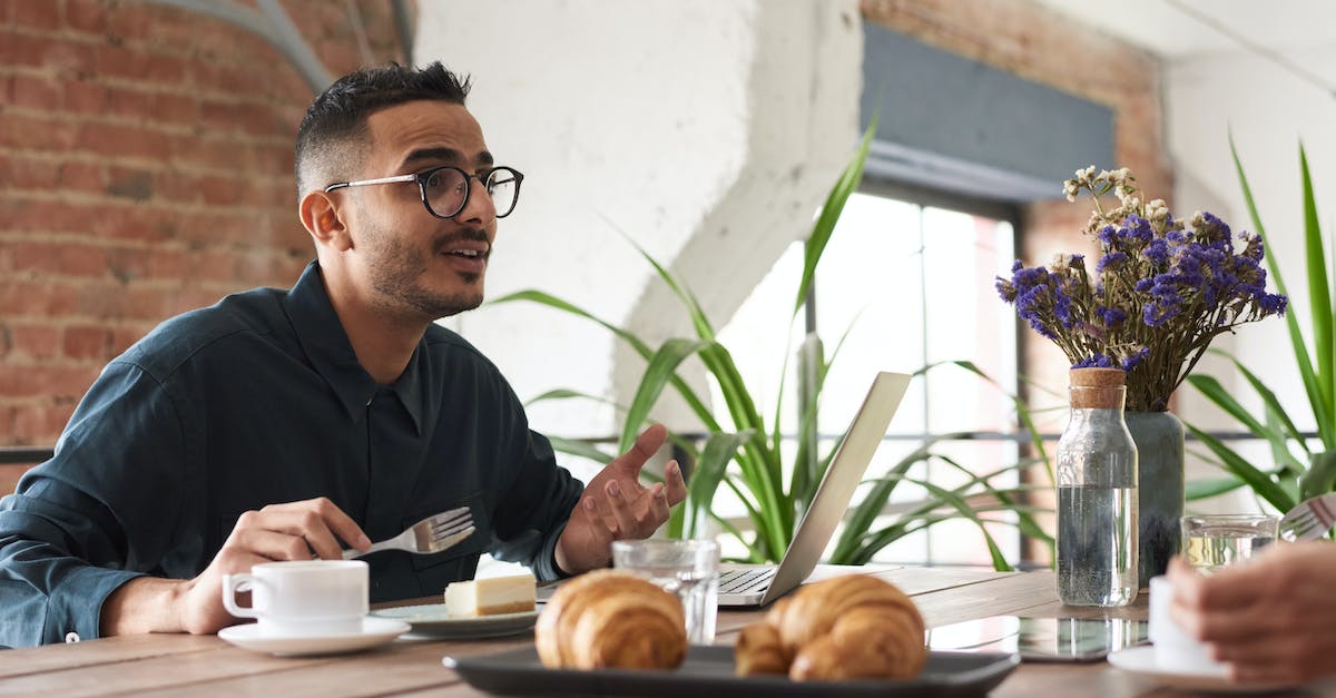 How do you kill the man eating plants? - Photo Of Man In Front Of His Laptop