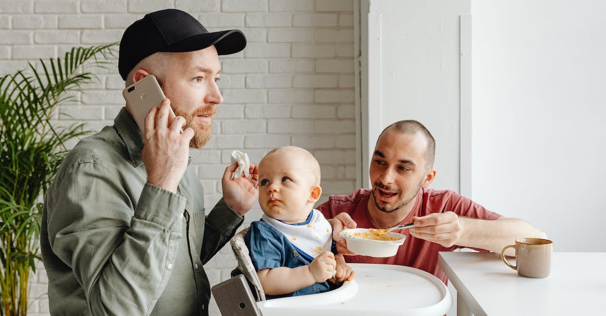 How do you kill the man eating plants? - Man in Green Long Sleeve Shirt Talking on his Phone