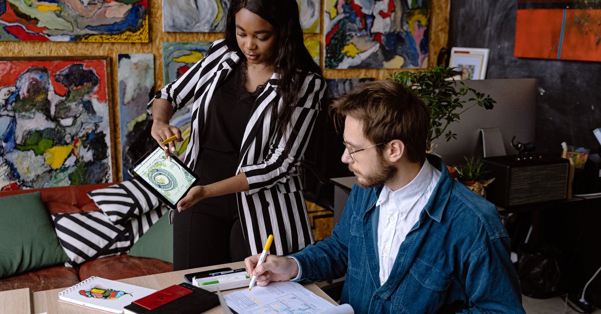 How do you link artes together? - Woman in Blue Jacket Reading Book