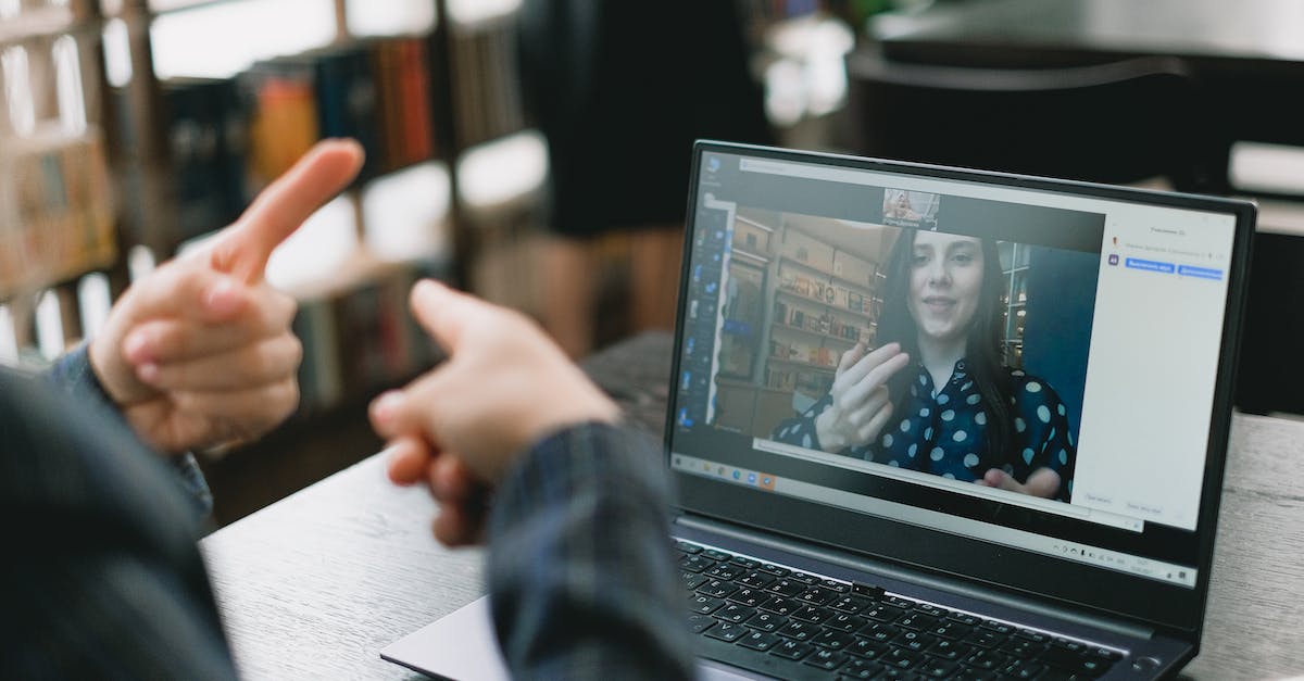 how do you make commands not show up on the chat - Young lady learning sign language during online lesson with female tutor