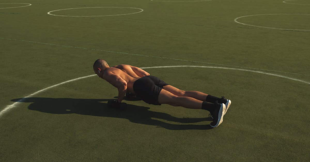 How do you make Cuphead black and white? - Man in Black Shorts Doing Push Ups on Green Field How do you make Cuphead black and white? - Man in Black Shorts Doing Push Ups on Green Field
