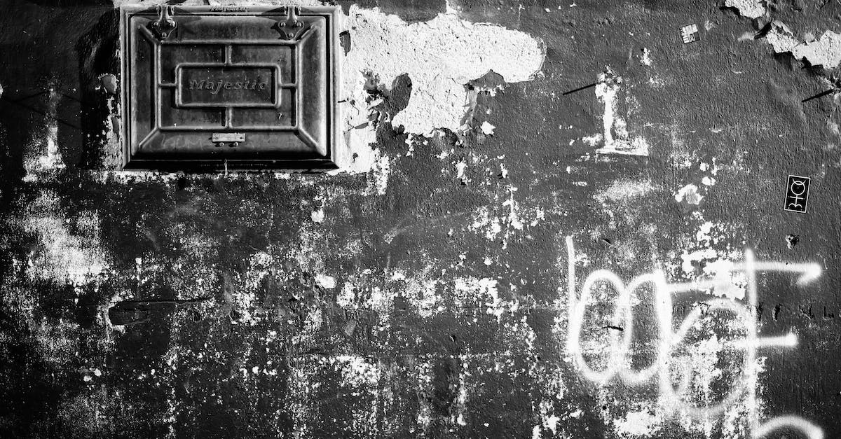 How do you max out damage output for the climax hex in dark souls 2 - Black and white of aged wall with cracked stucco and graffiti with letters