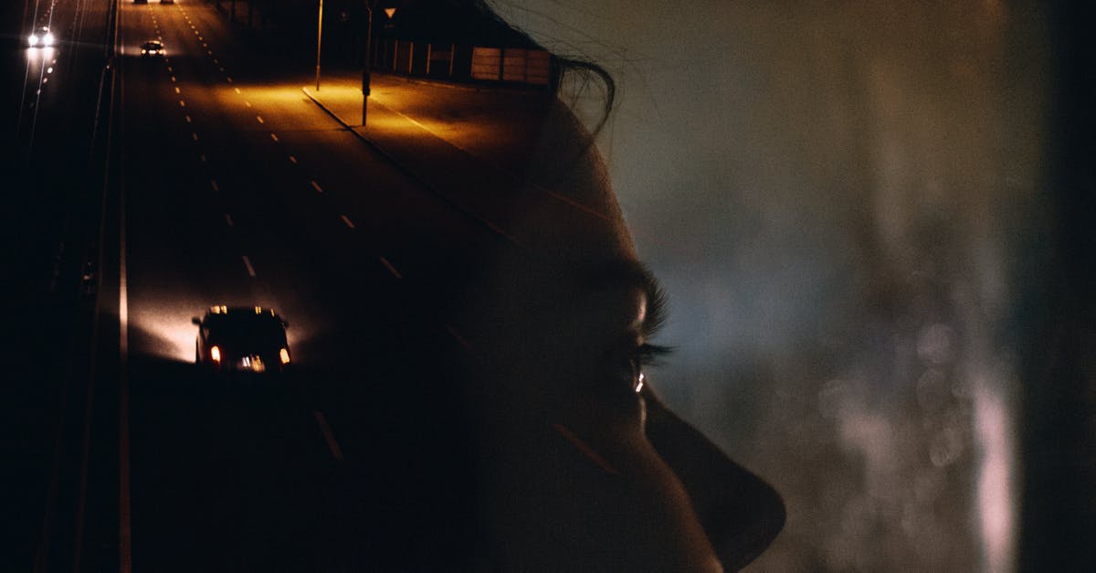 How do you move left during Night 5 on mobile? - Side view crop female sitting in car behind window glass reflecting road with moving cars and street lights at night How do you move left during Night 5 on mobile? - Side view crop female sitting in car behind window glass reflecting road with moving cars and street lights at night