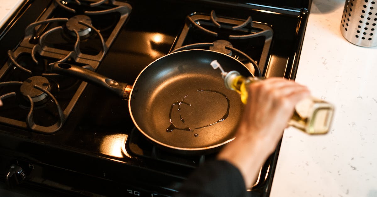 How do you pump Creosote Oil out of a Coke Oven - Crop unrecognizable chef pouring oil in frying pan
