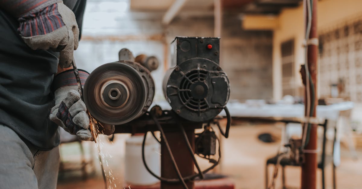 How do you rank up metal working skill? - Person Grinding a Tool How do you rank up metal working skill? - Person Grinding a Tool