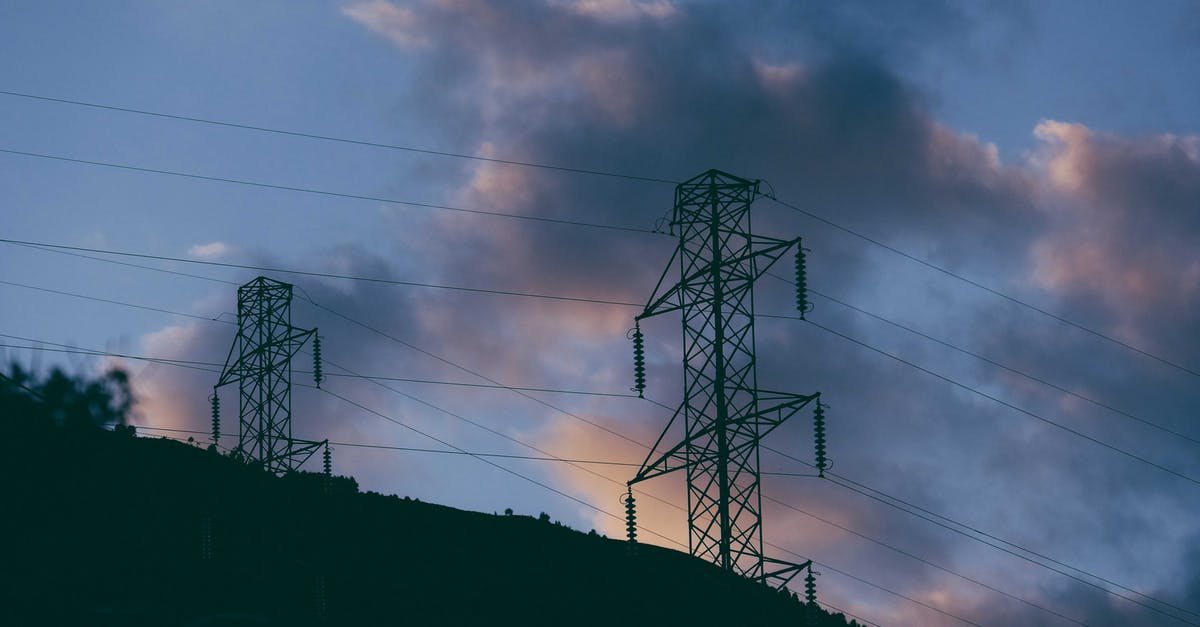 How do you remove a station from a line? - Electricity poles with cables located on hill at sundown
