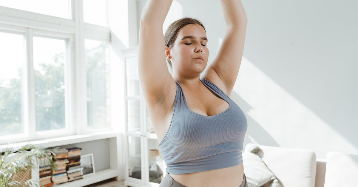 How do you reopen minecraft.exe on Windows 10 [closed] - Woman in Blue Tank Top and White Shorts Raising Her Hands