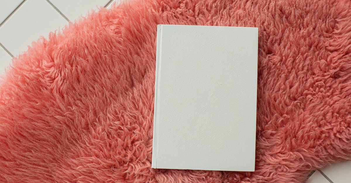 How do you re-unlock all story missions with a new character? - Blank white notebook placed on pink carpet