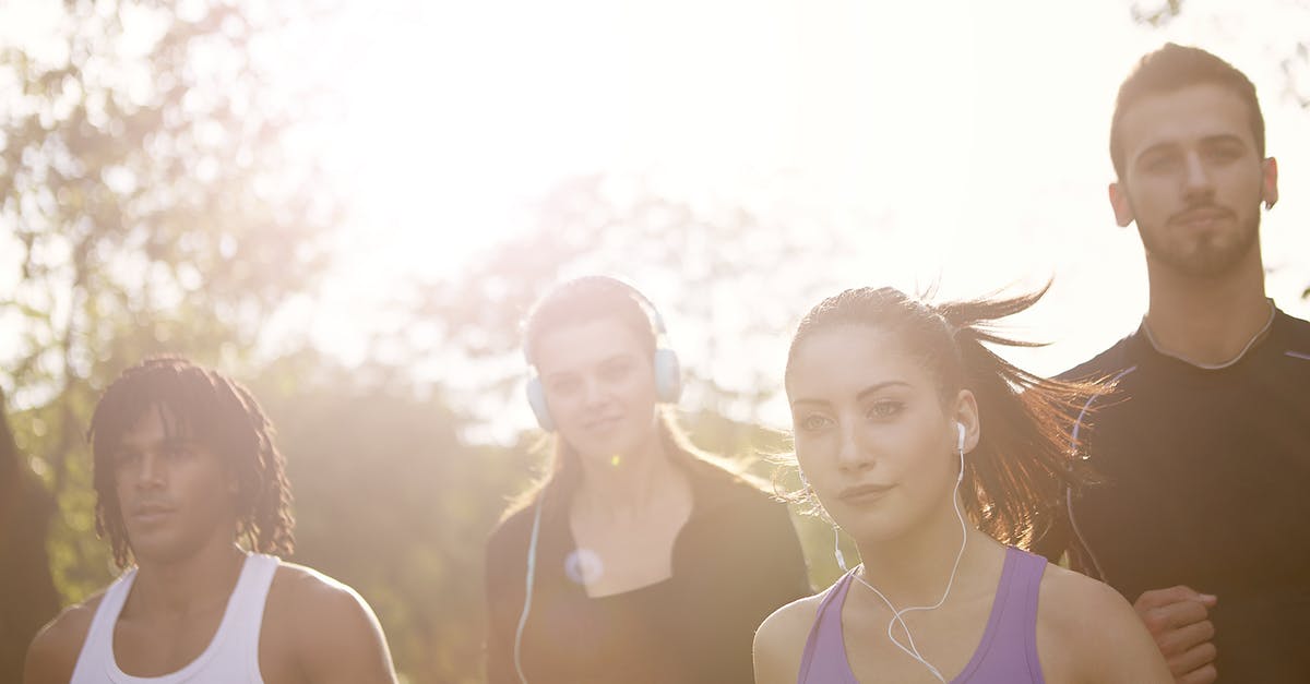 How do you run a command after some playsound music? - Group of young multiracial women with earphones and men in sportswear running together on sunny day in park How do you run a command after some playsound music? - Group of young multiracial women with earphones and men in sportswear running together on sunny day in park