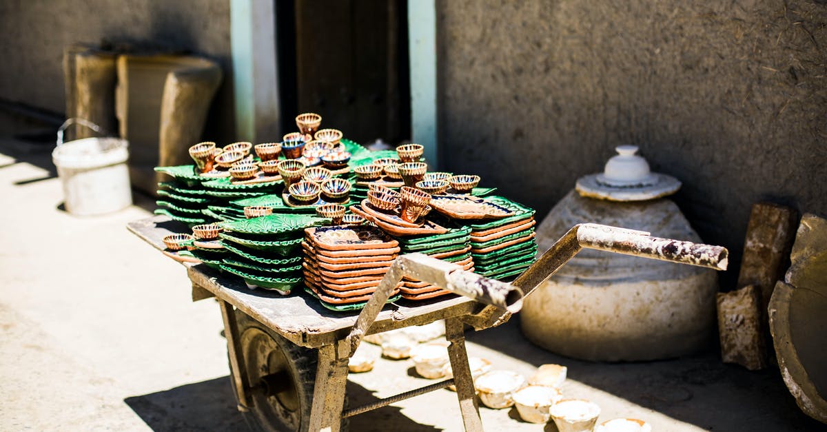 How do you sell items for returning dwellers? - Variety of Ceramic Items on a Wheelbarrow