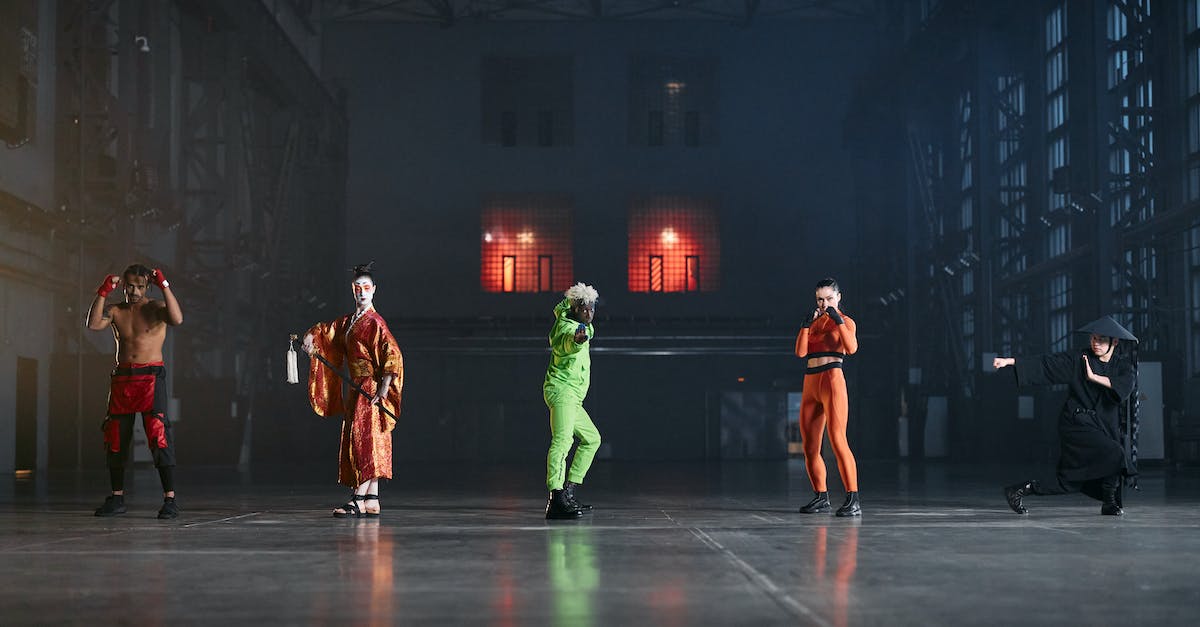 How do you unlock people in Tekken Revolution? - Group of People Wearing Green and Orange Costume